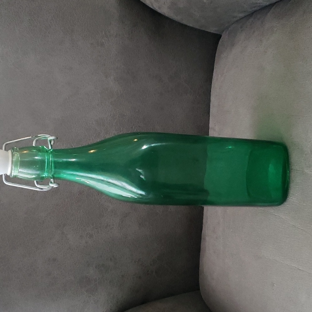 Vintage green glass bottle from Italy